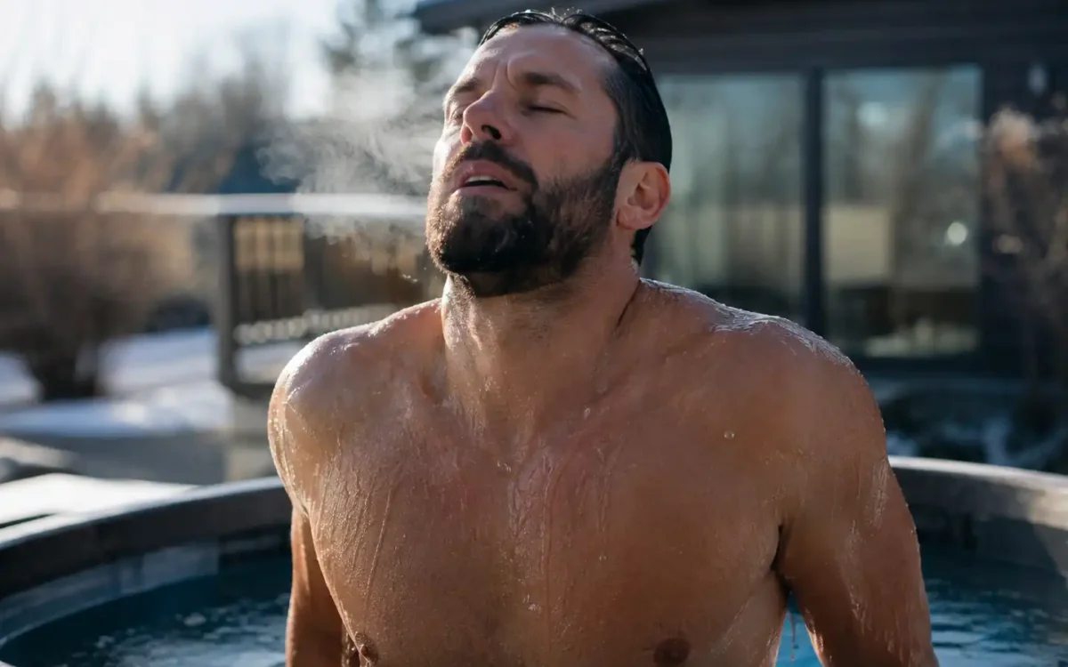 Person exhaling with visible relief after a cold plunge, illustrating cold plunge for anxiety relief